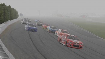 Mike Kelley (#80) leads David Boden (#28) into a foggy Turn 1 to start the race in Pocono.